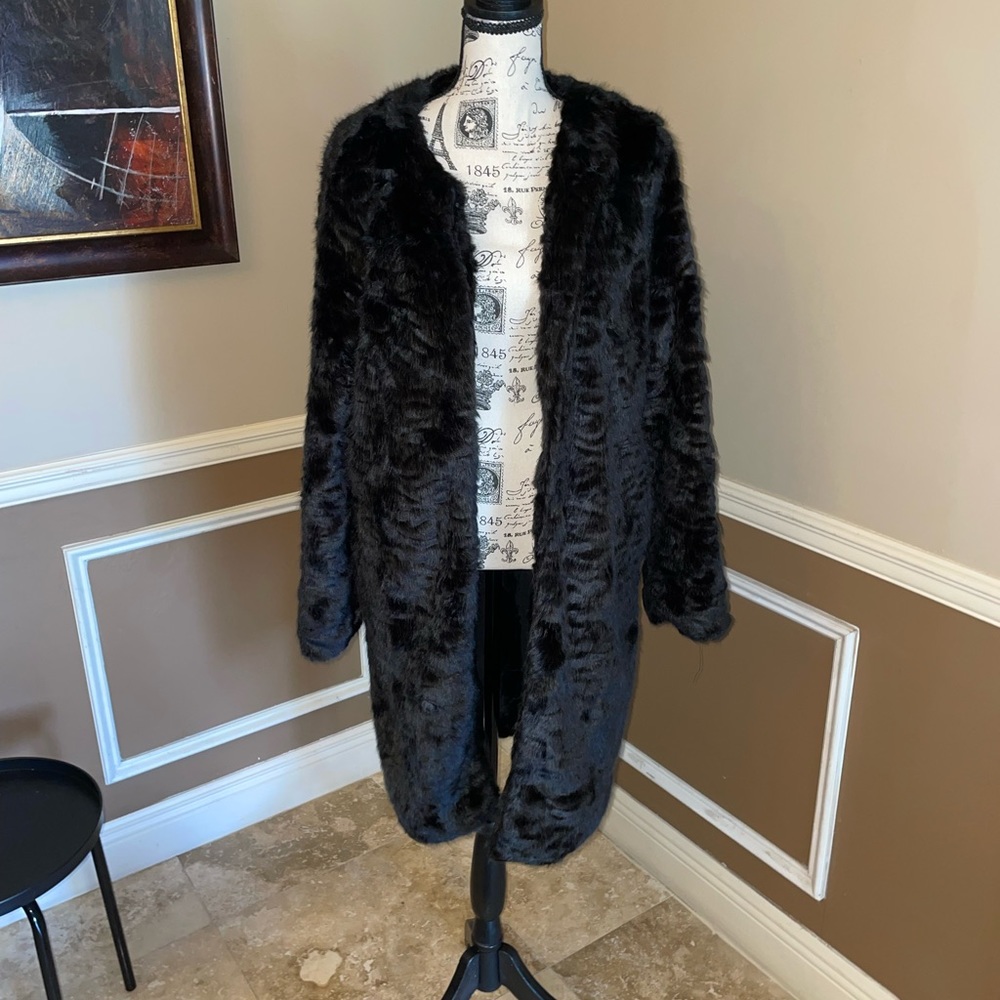 Black long fur coat 60’s styled.